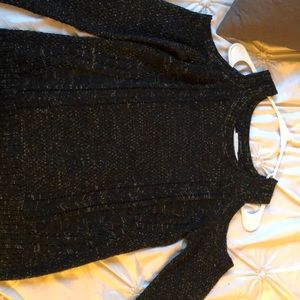 Black and gold sweater with shoulder cut out